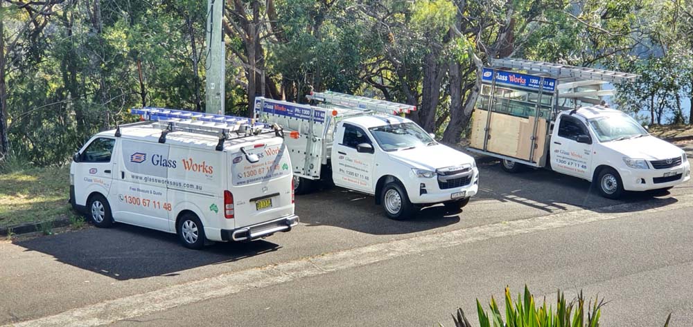 Glass Works (Australia) fleet of glazier vans loaded with glass racks